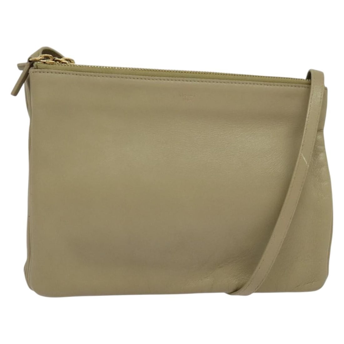 CELINE Trio Leather Shoulder Bag Beige Gold Made in Italy BA5505: CELINE Trio Leather Shoulder Bag Beige Gold Made in Italy BA5505 This CELINE Trio Shoulder Bag is a stylish accessory crafted from high-quality leather, featuring a sophisticated beige and gold color