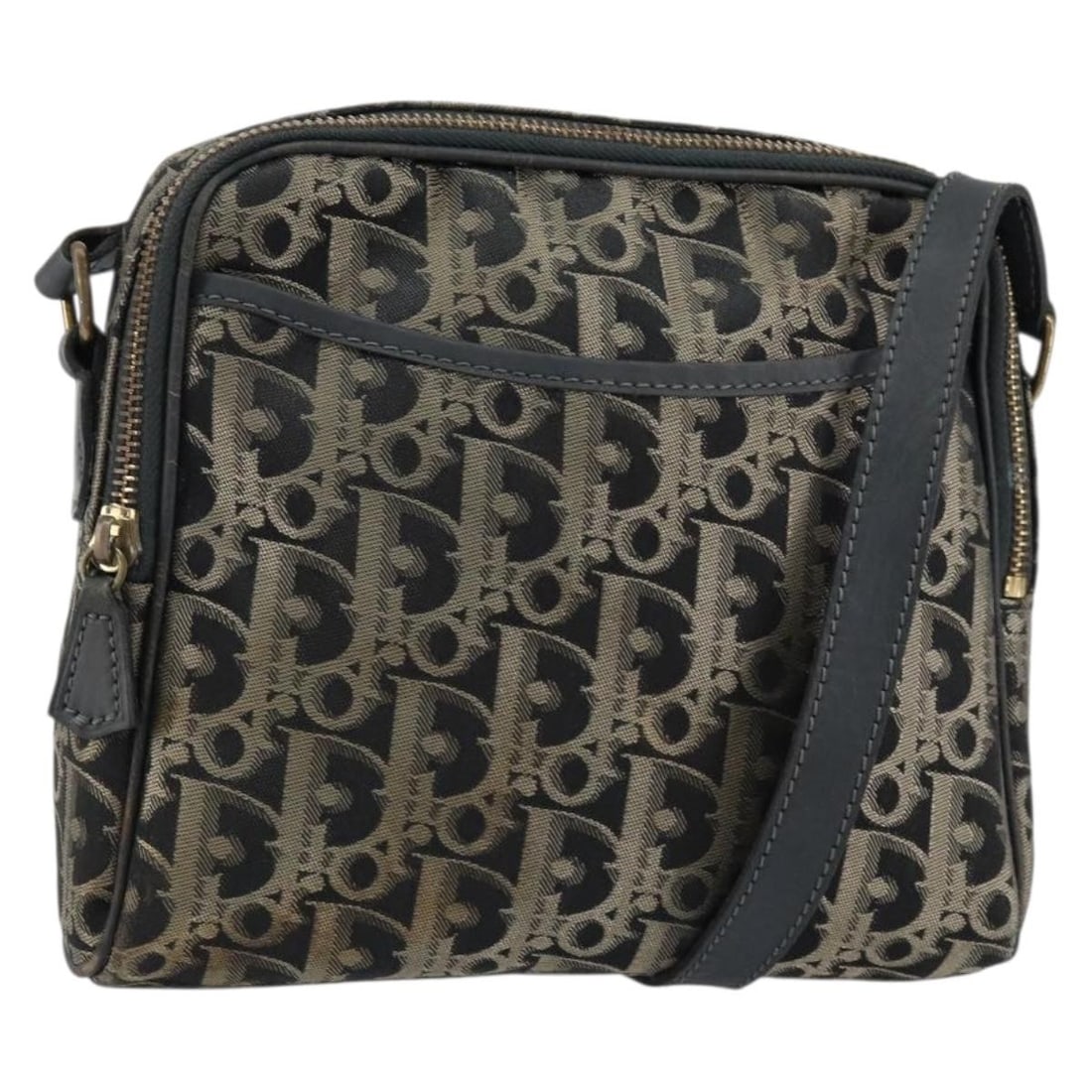 Christian Dior Black Trotter Canvas Shoulder Bag Gold Accents France: Christian Dior Black Trotter Canvas Shoulder Bag Gold Accents France This Christian Dior Trotter Canvas Shoulder Bag features a signature black and gold exterior with the iconic Trotter pattern. Made