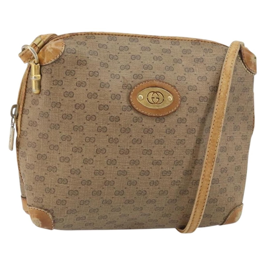 Micro GG Supreme Brown PVC Shoulder Bag by Gucci 007 104 4916: Micro GG Supreme Brown PVC Shoulder Bag by Gucci 007 104 4916 This GUCCI Micro GG Supreme shoulder bag features a brown and gold PVC leather exterior with micro GG canvas detailing. Made in Italy, it