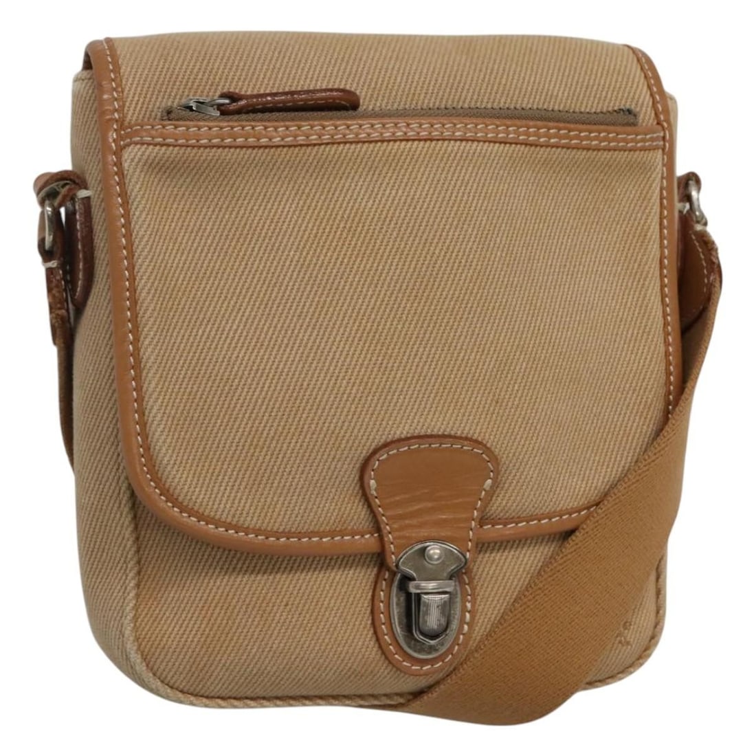 Burberry Blue Label Beige Canvas Shoulder Bag Made in Japan: Burberry Blue Label Beige Canvas Shoulder Bag Made in Japan This BURBERRY Blue Label Shoulder Bag is a stylish and practical accessory made from durable beige canvas. With approximate dimensions of 7.