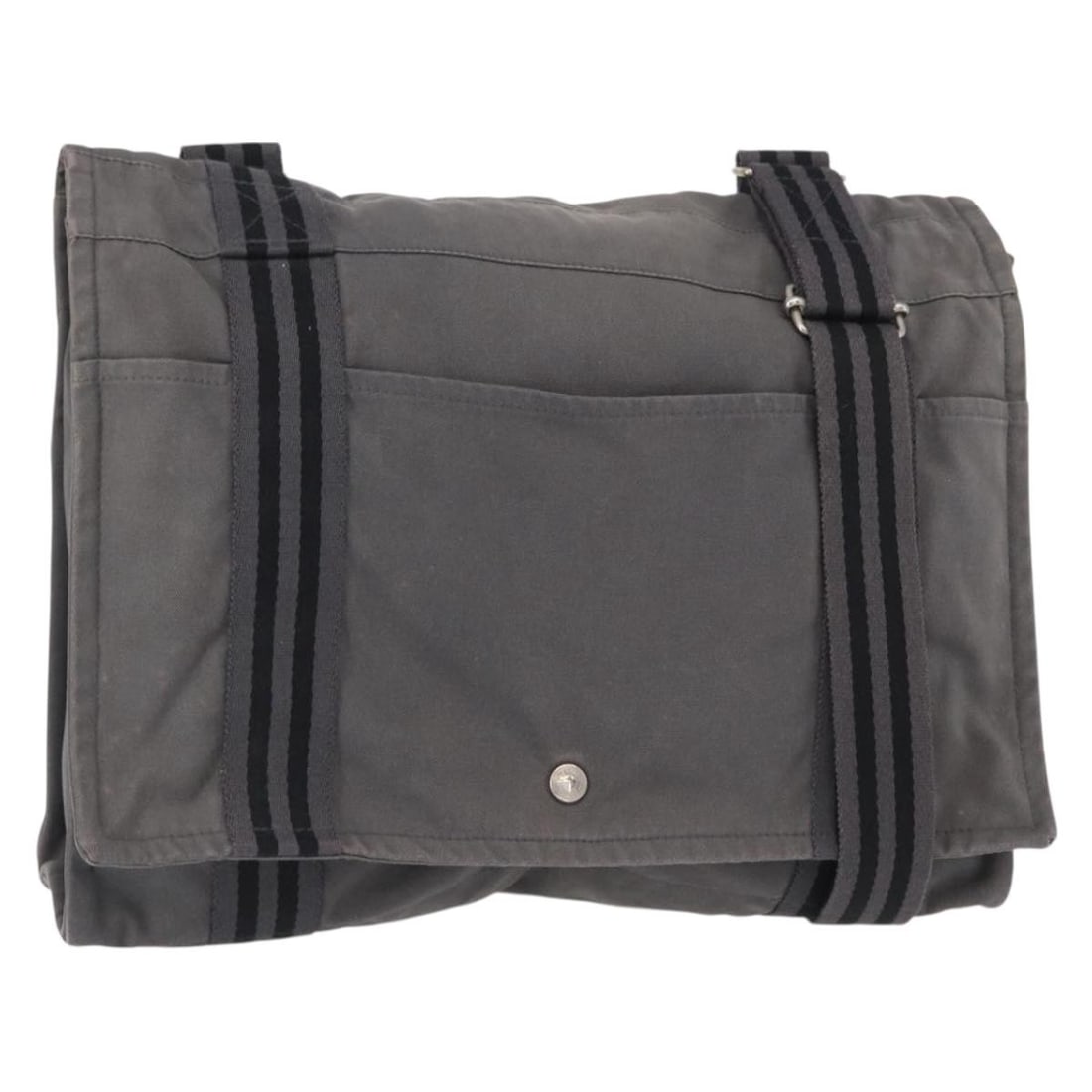 Gray Canvas Fourre Tout Bassas MM Shoulder Bag by Hermes: Gray Canvas Fourre Tout Bassas MM Shoulder Bag by Hermes This Hermes Fourre Tout Bassas MM shoulder bag features a durable gray canvas exterior with a spacious interior, perfect for everyday use. The