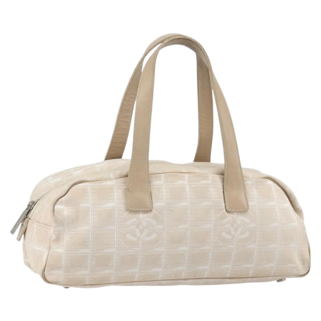 Chanel Beige Nylon New Travel Line Handbag with CC Logo: Chanel Beige Nylon New Travel Line Handbag with CC Logo This CHANEL New Travel Line hand bag is crafted from beige nylon and features the iconic CC design. Made in Italy, the bag is designed with a sp