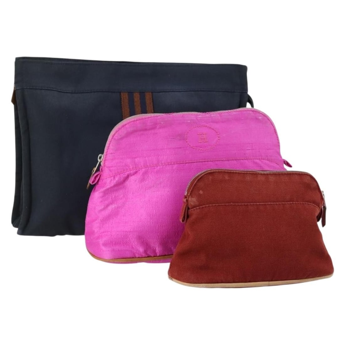 HERMES Canvas Pouch Set of 3 Pink Black Brown Authentic: HERMES Canvas Pouch Set of 3 Pink Black Brown Authentic This HERMES Pouch Canvas set includes three pouches in a stylish combination of pink, black, and brown. Crafted from durable canvas, these pouch