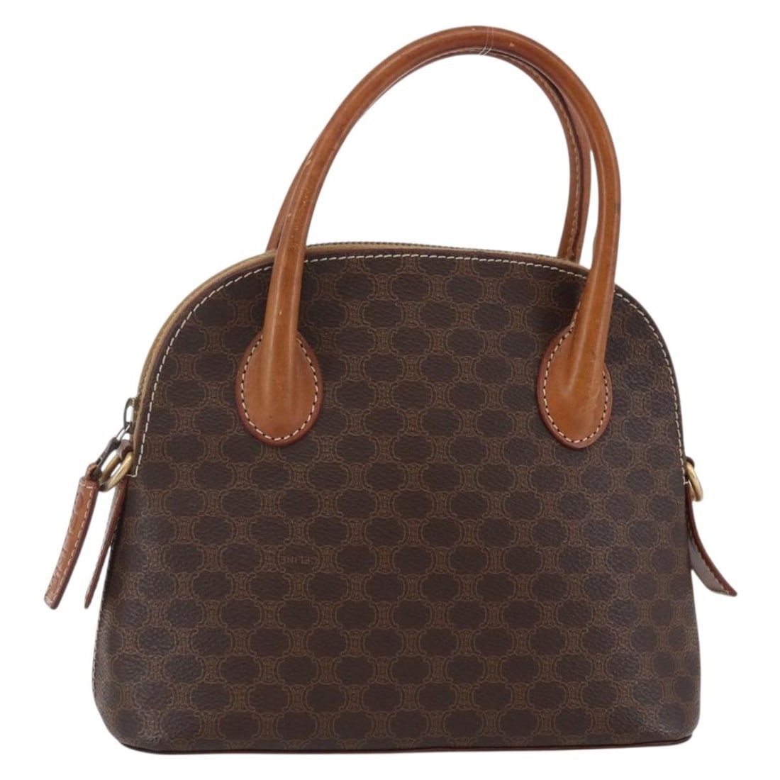 CELINE Brown PVC Leather Macadam Canvas Hand Bag Italy Auth: CELINE Brown PVC Leather Macadam Canvas Hand Bag Italy Auth This authentic CELINE Macadam Canvas Hand Bag is crafted from durable PVC leather in a rich brown color. Made in Italy, this stylish handbag