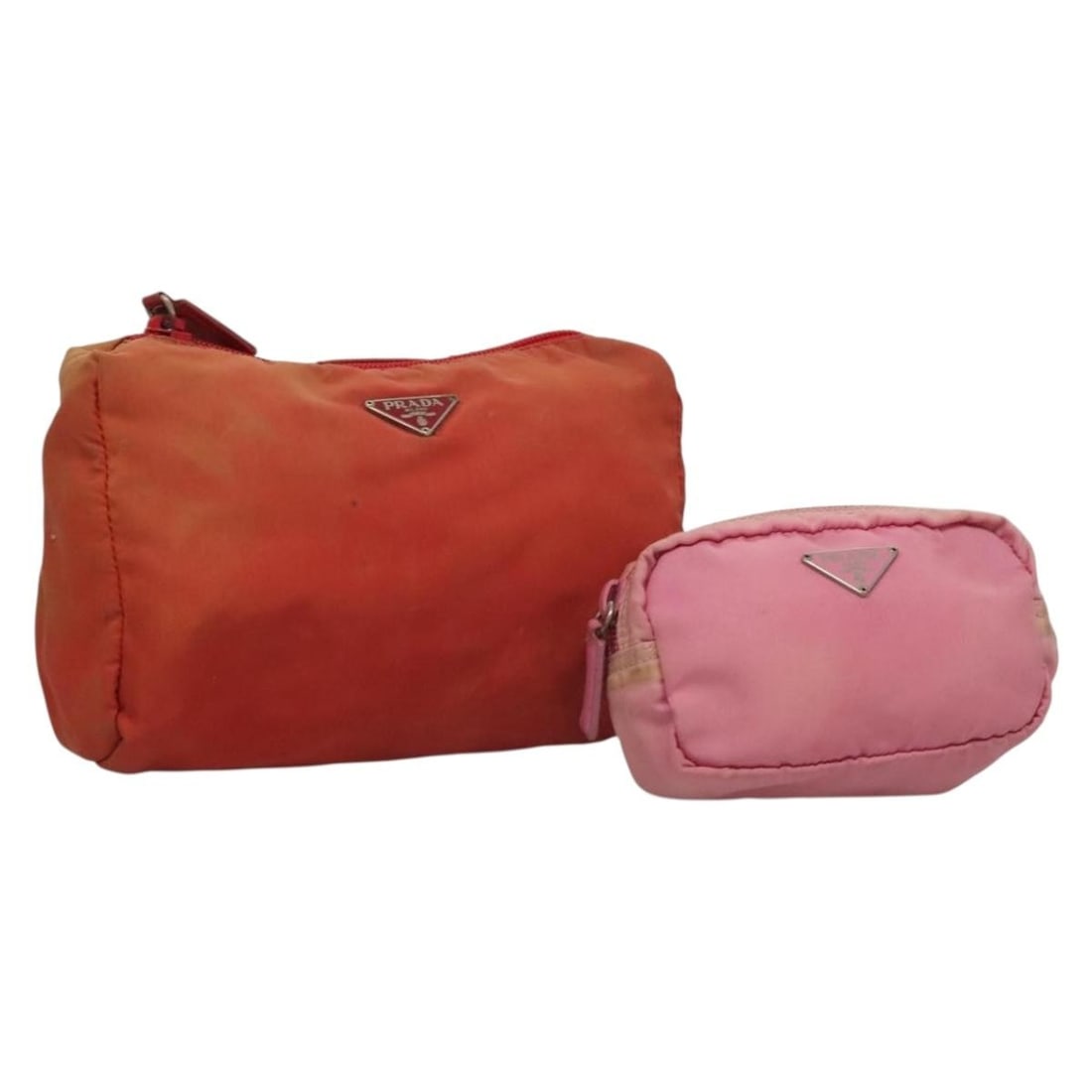 PRADA Pink Red Nylon Pouch Set of 2 Authentic: PRADA Pink Red Nylon Pouch Set of 2 Authentic This PRADA Pouch set features a stylish combination of pink and red nylon, perfect for adding a pop of color to your accessories collection. The pouch is