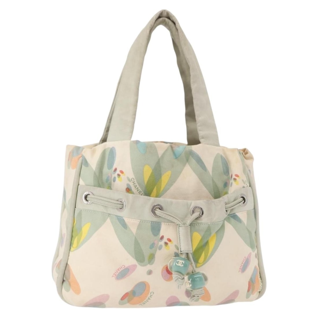 CHANEL White Silver Canvas Tote Bag Italy Authentic: CHANEL White Silver Canvas Tote Bag Italy Authentic This authentic CHANEL Tote Bag is a stylish accessory crafted from durable canvas, featuring a chic white and silver color combination that compleme