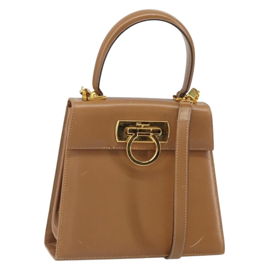 Salvatore Ferragamo Gancini Beige Leather Convertible Shoulder and Handbag: Salvatore Ferragamo Gancini Beige Leather Convertible Shoulder and Handbag This Salvatore Ferragamo Gancini 2-way handbag is crafted from beige and gold leather and features both a top handle and a de