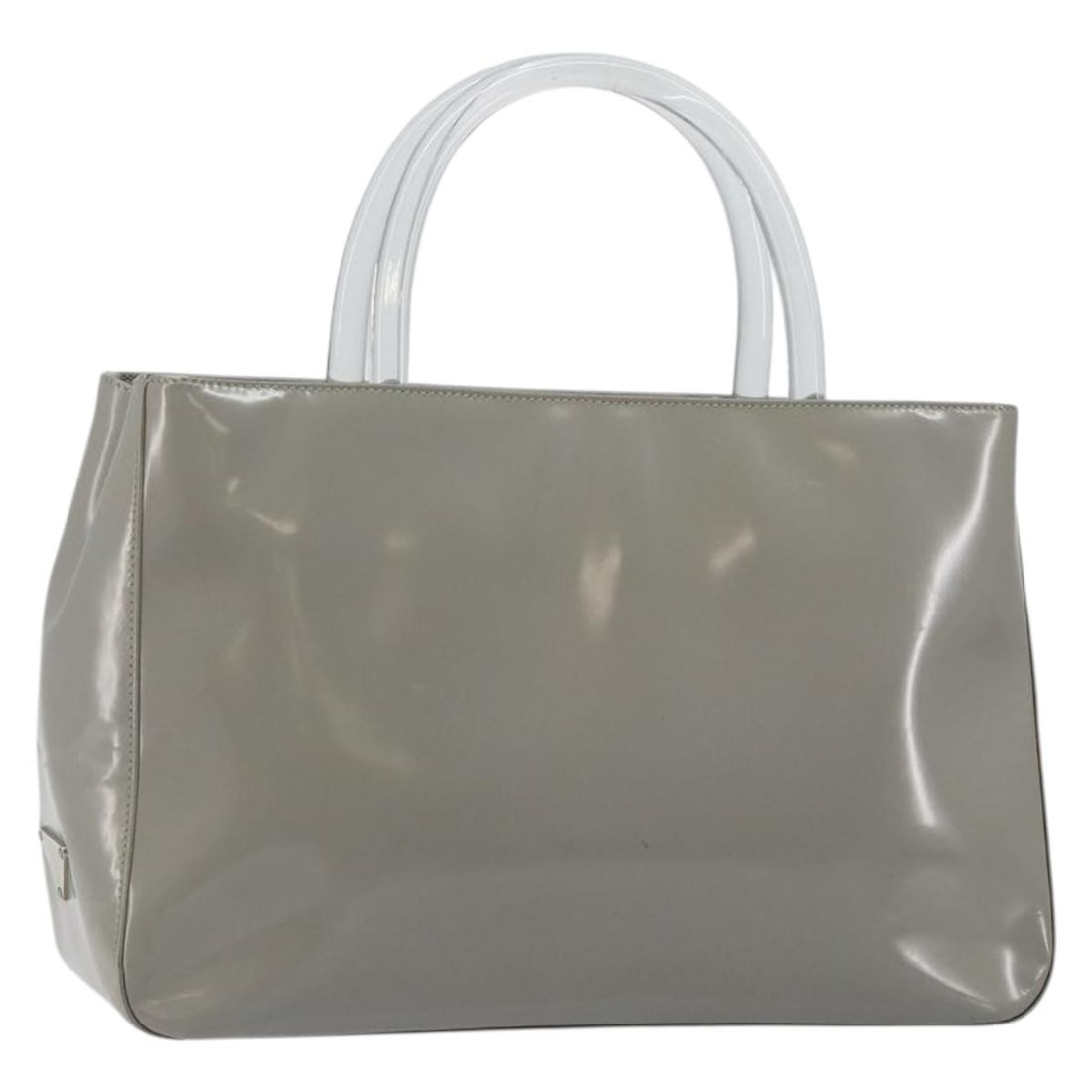 PRADA Gray Silver Enamel Hand Bag Made in Italy BA5946: PRADA Gray Silver Enamel Hand Bag Made in Italy BA5946 This PRADA hand bag is a stylish accessory crafted from enamel in a sophisticated gray and silver color combination. Designed for both functional