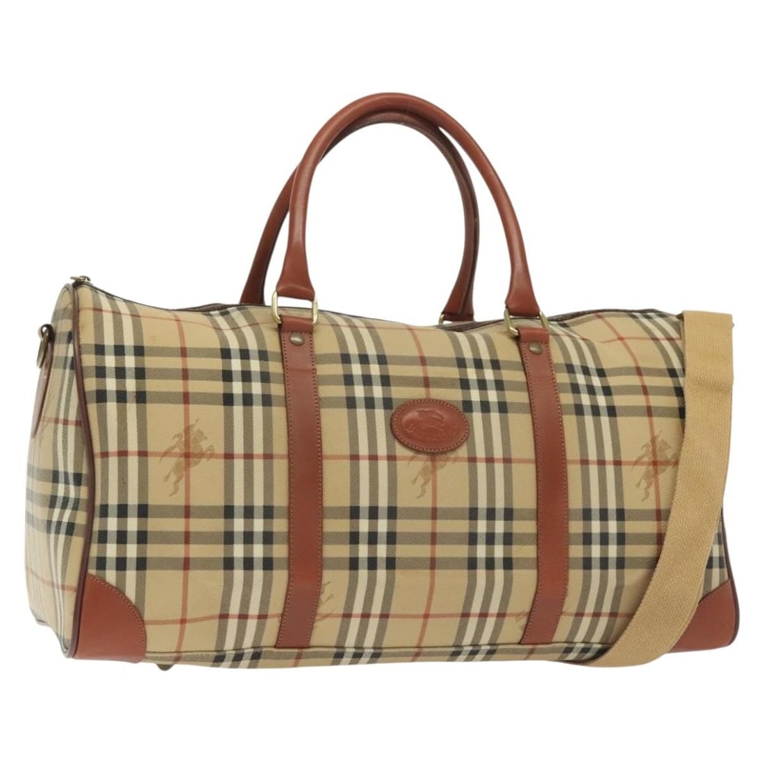 Burberrys Nova Check Beige PVC Boston Bag 2way Made in Italy: Burberrys Nova Check Beige PVC Boston Bag 2way Made in Italy Introducing the Burberrys Nova Check Boston Bag, an elegant accessory crafted from durable PVC leather in a sophisticated beige hue. This b
