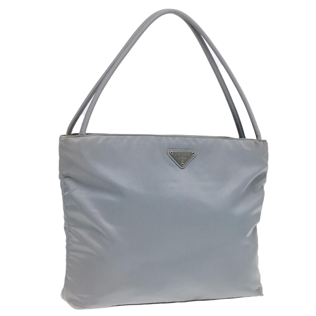 PRADA Light Blue Silver Nylon Tote Bag Made in Italy: PRADA Light Blue Silver Nylon Tote Bag Made in Italy This PRADA tote bag is a stylish accessory crafted from durable nylon, featuring a light blue and silver color combination. Measuring approximately