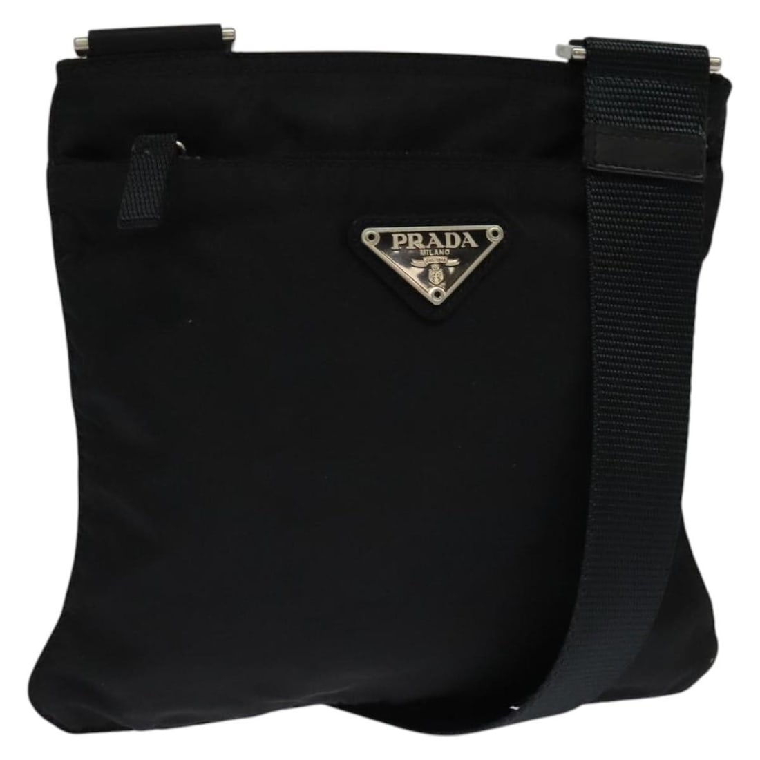 PRADA Black Silver Nylon Shoulder Bag Authentic Made in Italy: PRADA Black Silver Nylon Shoulder Bag Authentic Made in Italy This authentic PRADA shoulder bag features a sleek black and silver nylon exterior, designed for both style and functionality. Measuring a
