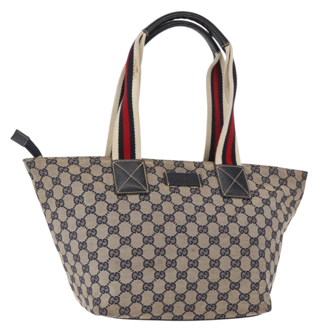 Navy GG Canvas Tote by Gucci Sherry Line Model 131230 Italy: Navy GG Canvas Tote by Gucci Sherry Line Model 131230 Italy This GUCCI GG Canvas Sherry Line tote bag features a navy blue exterior crafted from signature GG canvas. The bag is designed with a spaciou
