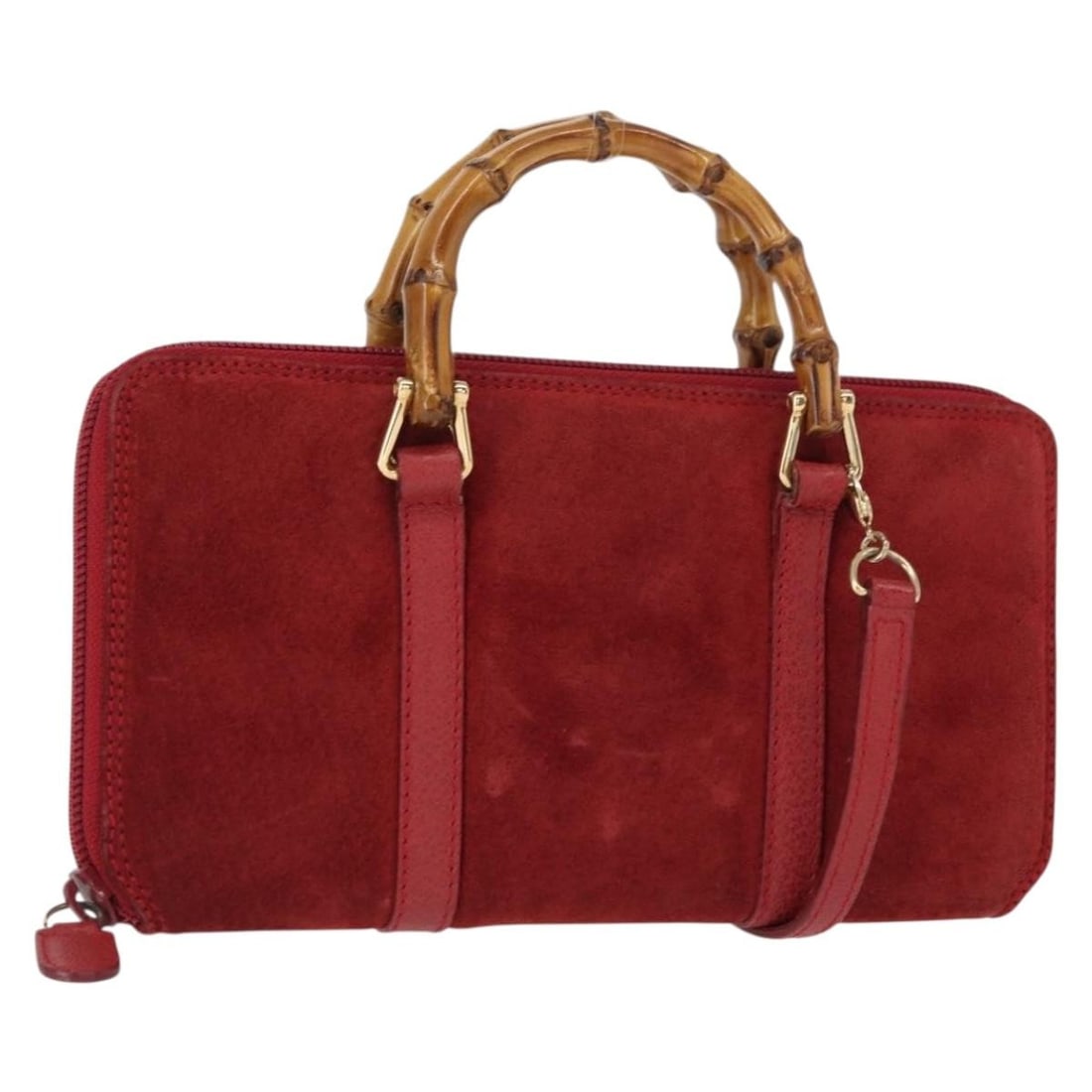 Red Suede Gucci Bamboo Shoulder Bag with Gold Accents and 2way Strap: Red Suede Gucci Bamboo Shoulder Bag with Gold Accents and 2way Strap This Gucci bamboo shoulder wallet is a 2-way shoulder bag crafted in Italy from red suede and GG canvas, featuring gold-tone accent