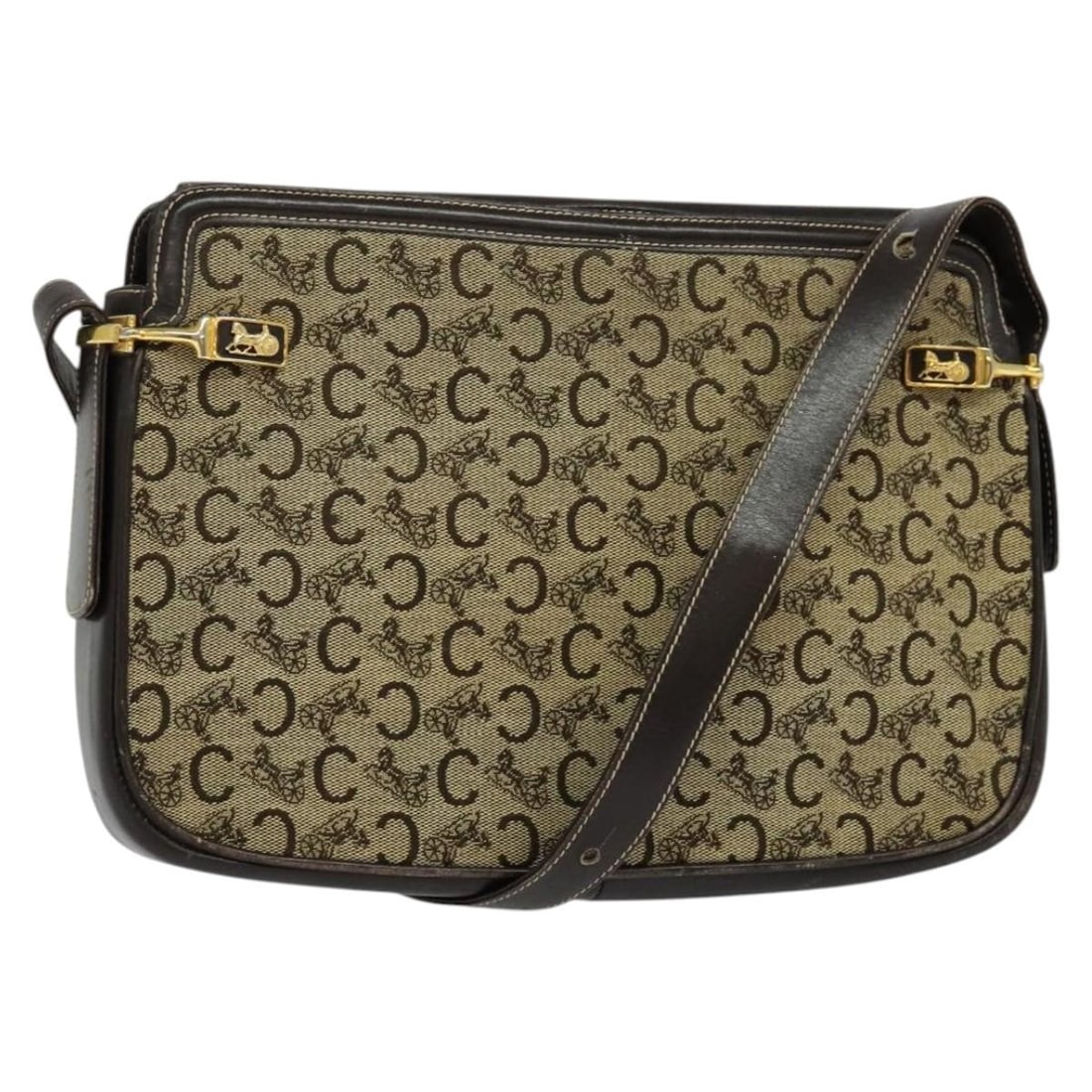 CELINE C Sulky Canvas Shoulder Bag Beige Gold Made in Italy: CELINE C Sulky Canvas Shoulder Bag Beige Gold Made in Italy This CELINE C Sulky Shoulder Bag is a stylish accessory crafted from durable canvas in a sophisticated beige and gold color scheme. The bag