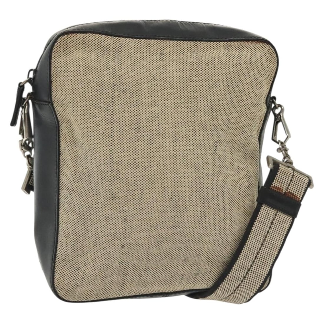 PRADA Canvas Shoulder Bag Beige Black Silver Made in Italy: PRADA Canvas Shoulder Bag Beige Black Silver Made in Italy This PRADA shoulder bag is a stylish blend of canvas and leather, showcasing an elegant beige, black, and silver color palette. The bag featu