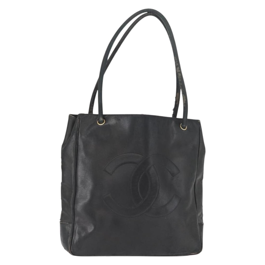 Black Lambskin Shoulder Bag by CHANEL with Gold CC Logo: Black Lambskin Shoulder Bag by CHANEL with Gold CC Logo This CHANEL shoulder bag is crafted from lambskin leather in black with gold accents. The bag is designed with a classic shoulder strap and feat