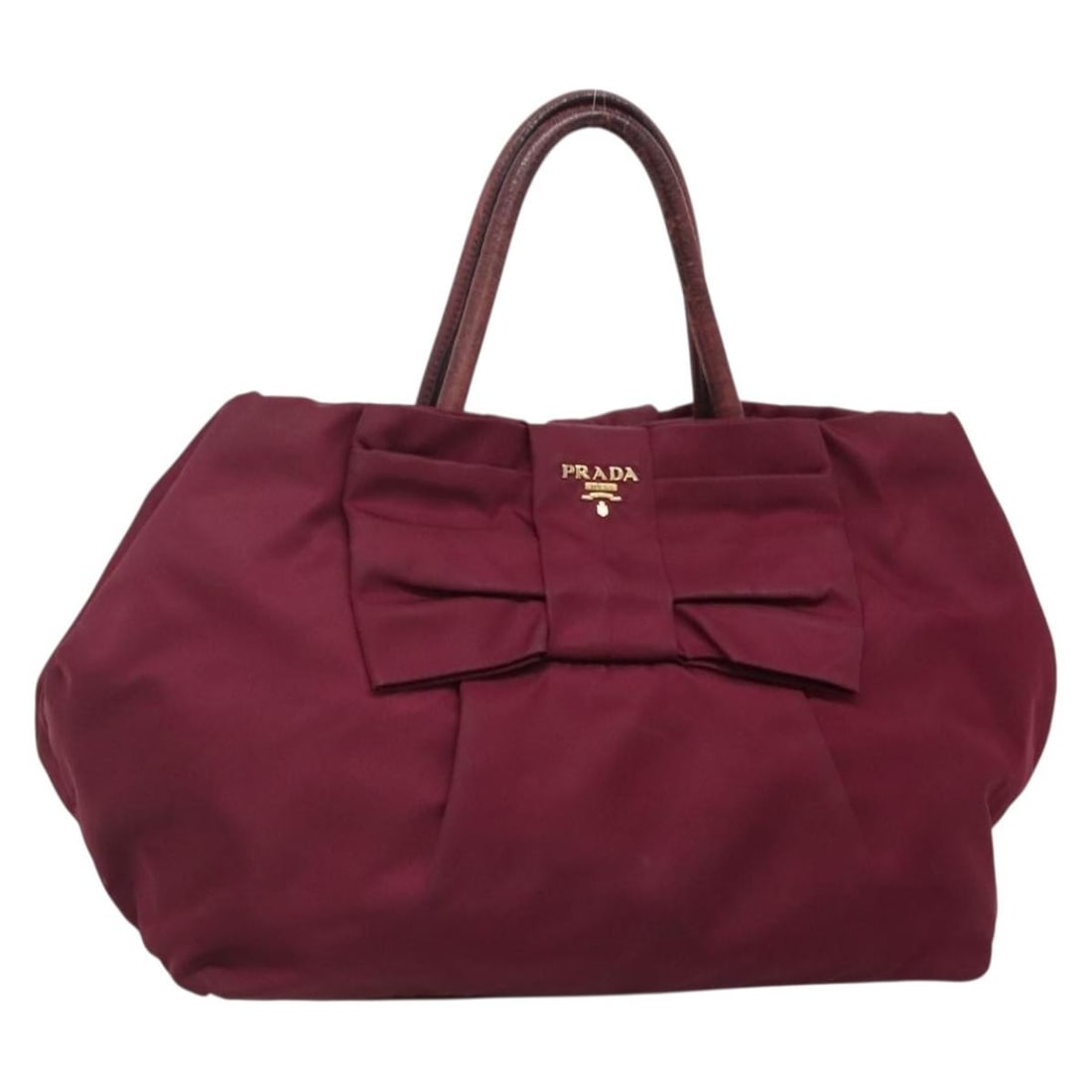 PRADA Purple Gold Nylon Hand Bag Made in Italy Auth 141705: PRADA Purple Gold Nylon Hand Bag Made in Italy Auth 141705 Elevate your style with this authentic PRADA Hand Bag, expertly crafted in Italy from durable nylon. This stunning bag features a rich purple