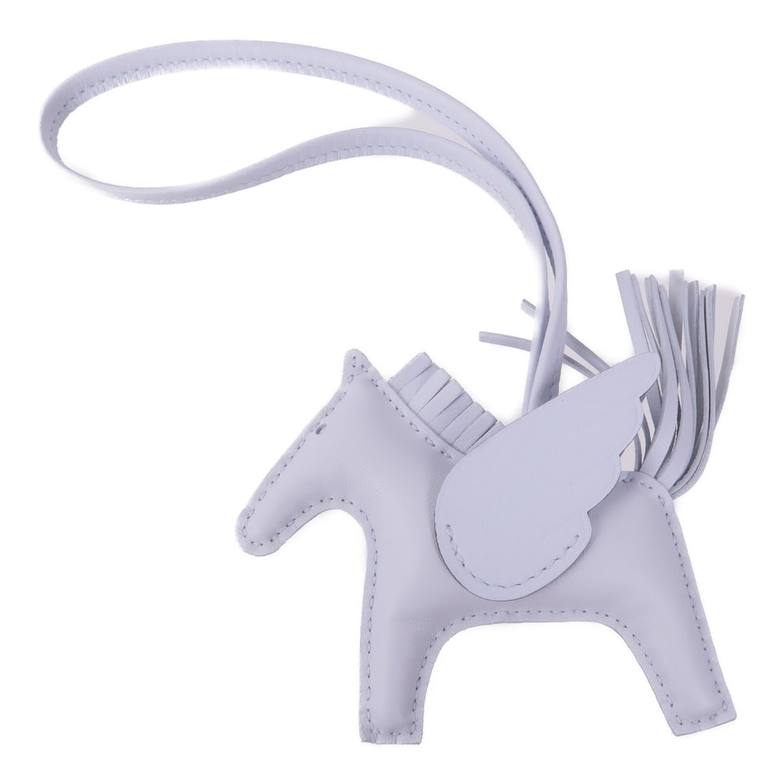 HERMES Rodeo Pegase PM Charm Light Blue Calfskin Leather: HERMES Rodeo Pegase PM Charm Light Blue Calfskin Leather The HERMES Rodeo Pegase PM Charm is an exquisite accessory crafted from premium Veau Swift leather, featuring a stunning light blue hue. This c