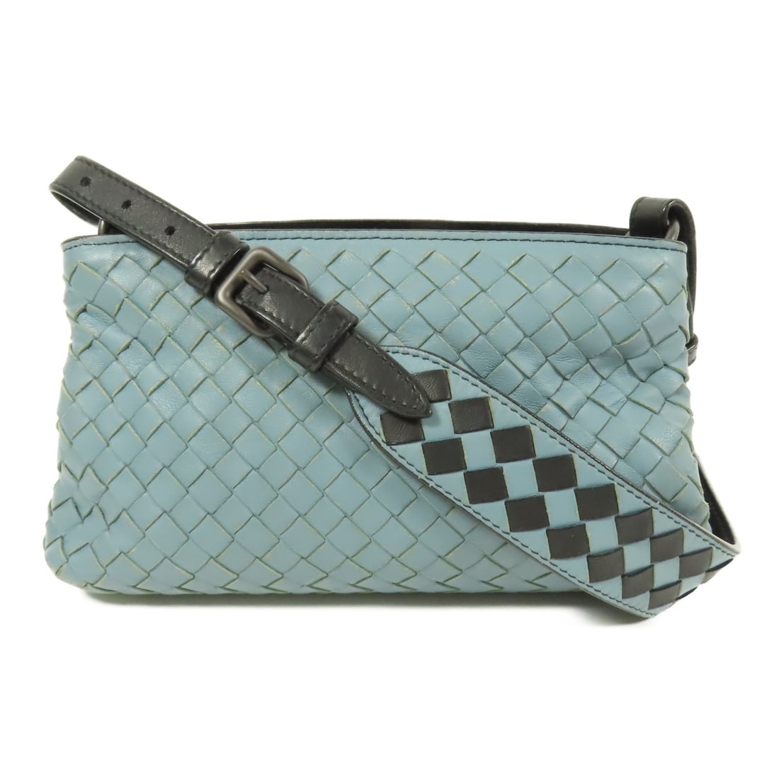 Bottega Veneta Mini Shoulder Bag Blue Lambskin Leather: Bottega Veneta Mini Shoulder Bag Blue Lambskin Leather Introducing the Bottega Veneta Mini Shoulder Bag, crafted from luxurious lambskin leather in a stunning blue hue. This stylish shoulder bag is de