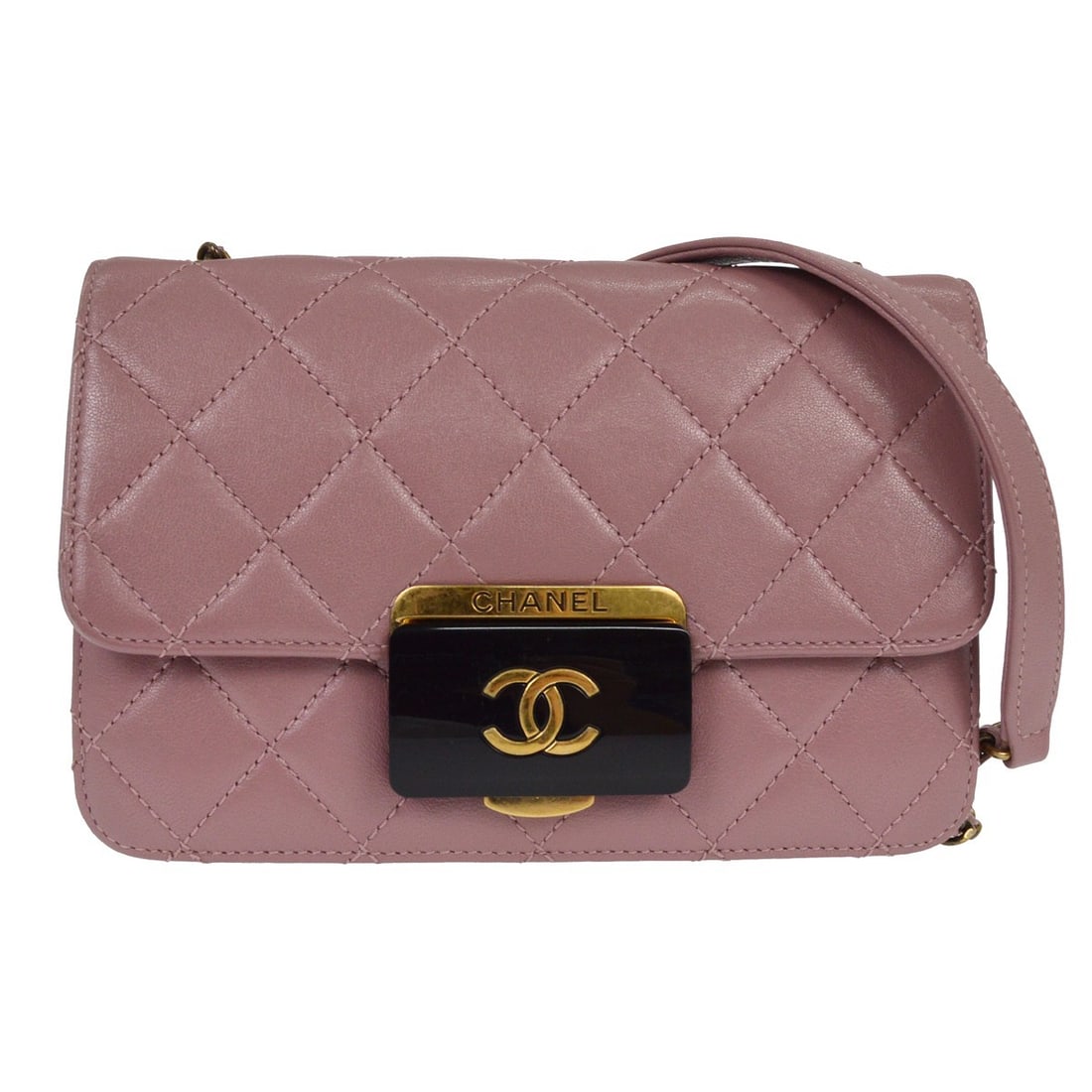 Chanel Purple Beauty Lock Flap Shoulder Bag: Chanel Purple Beauty Lock Flap Shoulder Bag This Chanel Beauty Lock Flap Bag in purple features a classic shoulder bag silhouette. The exterior is in good condition, showing minor scuffs and dirt on t