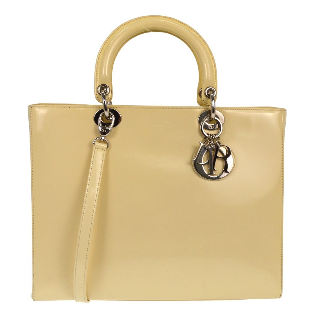Beige Vintage Lady Dior Handbag by Christian Dior: Beige Vintage Lady Dior Handbag by Christian Dior This is a Christian Dior vintage Lady Dior handbag in beige. The bag shows fair condition overall, with scuffs and dirt present on the bottom edges an