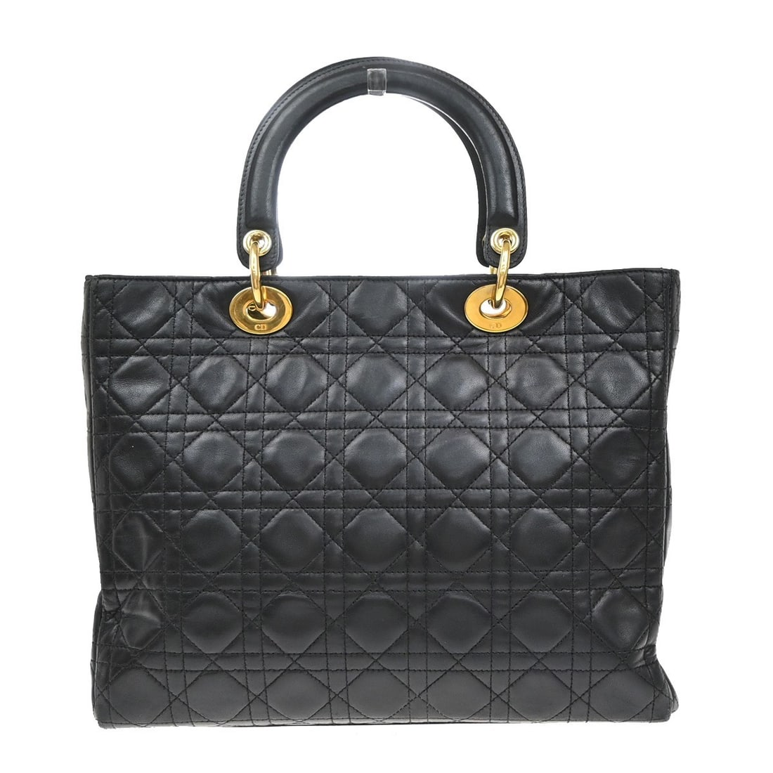 Lady Dior Cannage Black Tote Handbag by Christian Dior: Lady Dior Cannage Black Tote Handbag by Christian Dior This pre-owned Christian Dior vintage Lady Dior Cannage tote bag features a classic black exterior with noticeable signs of use, including scuffs