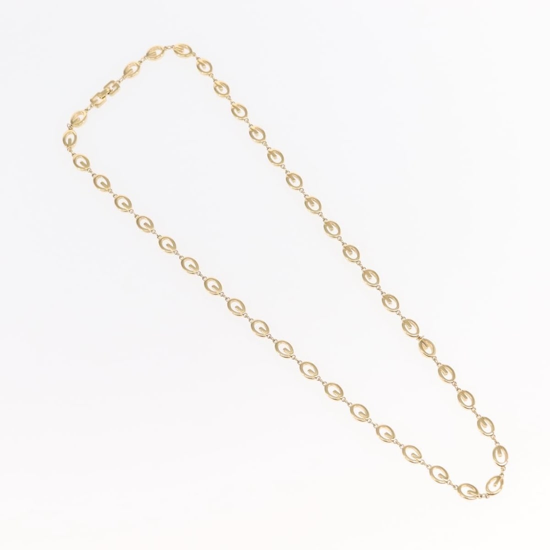 Gold Tone Rounded G Link Choker Necklace by Givenchy: Gold Tone Rounded G Link Choker Necklace by Givenchy This pre-owned Givenchy rounded G link choker necklace features a gold finish and is designed for women. The necklace is in excellent condition, sh