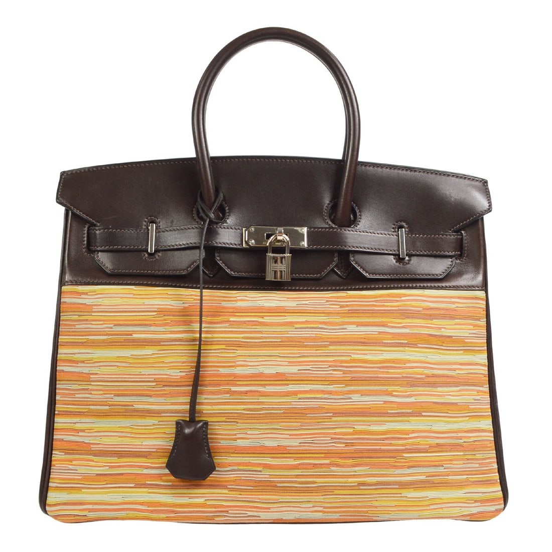Birkin 35 Orange and Brown Leather Handbag by Hermes: Birkin 35 Orange and Brown Leather Handbag by Hermes This Hermes Birkin handbag features a stylish brown and orange color combination. Designed for women, it is in very good, un-used condition both in
