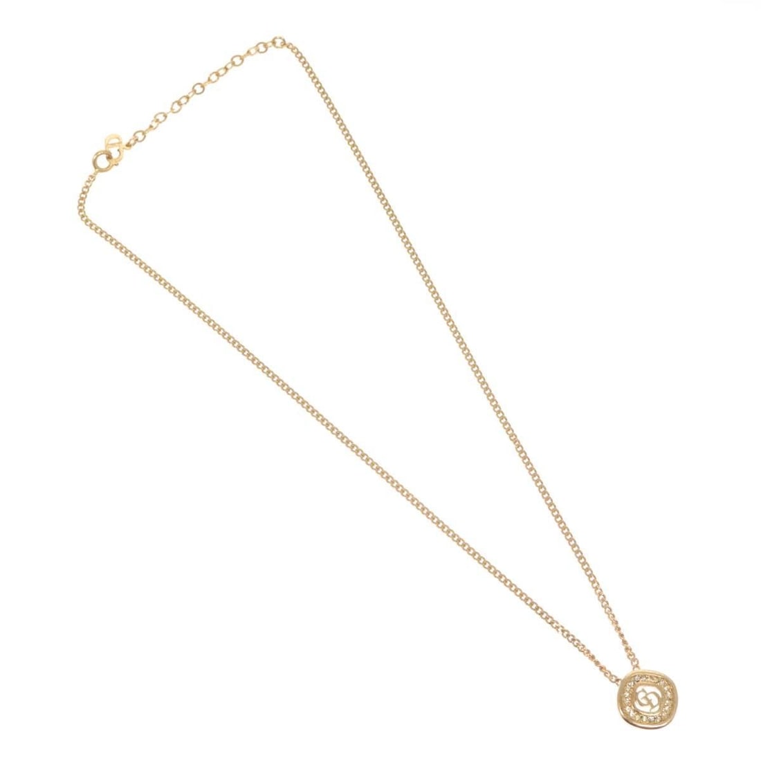 Pendant Necklace with CD Logo by Christian Dior in Gold: Pendant Necklace with CD Logo by Christian Dior in Gold This Christian Dior pendant necklace features a gold tone finish and is designed for women. The necklace shows some scratches on the surface and