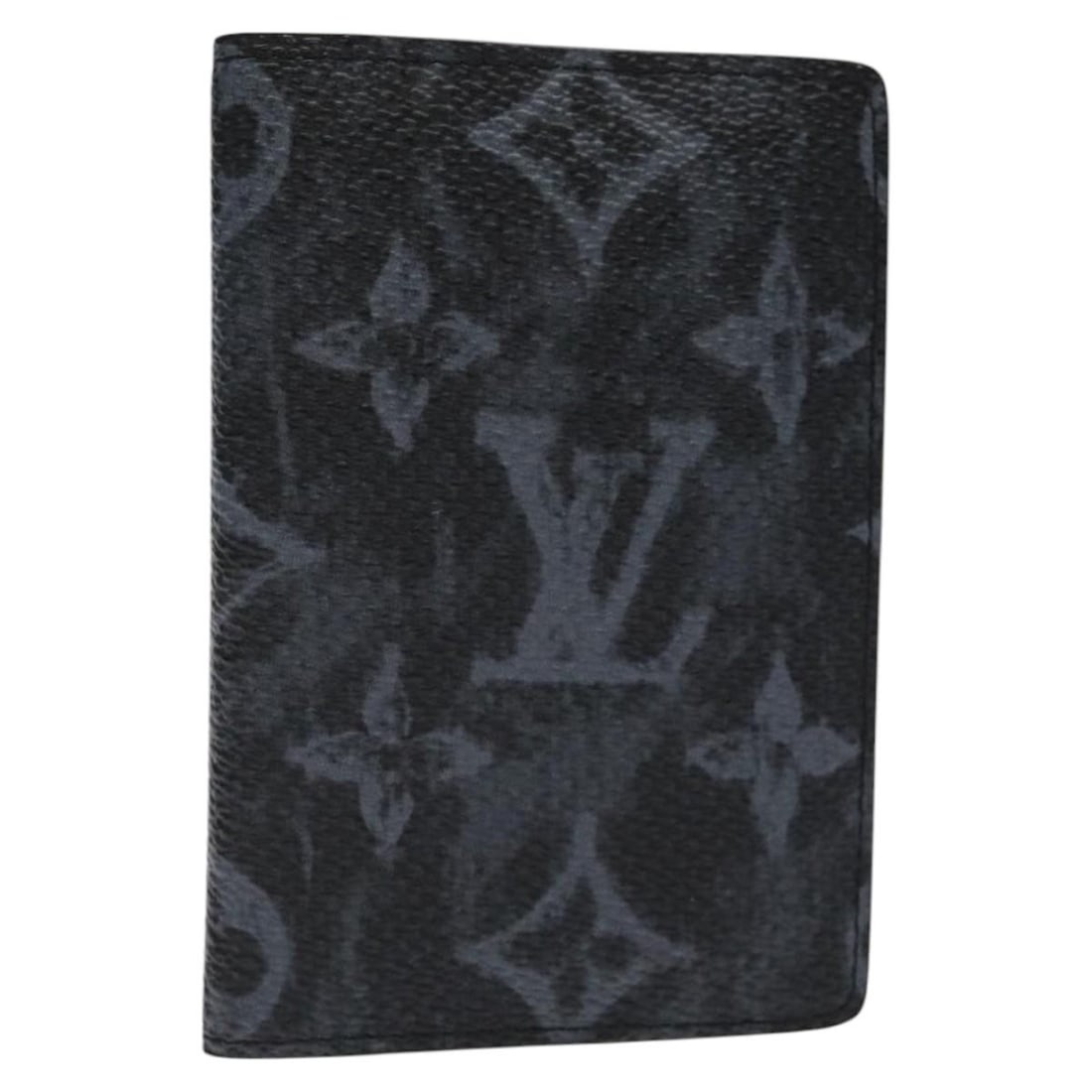 Pre-Owned Black Card Case Pocket Organizer by Louis Vuitton: Pre-Owned Black Card Case Pocket Organizer by Louis Vuitton This un-used Louis Vuitton Pocket Organizer card case is crafted in black and remains in excellent condition with no notable scratches or od