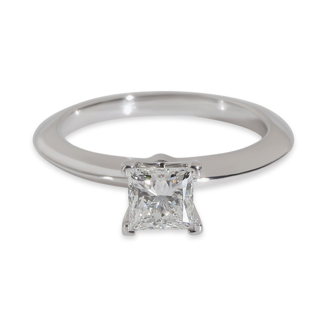 Tiffany & Co. 0.51 ct Princess Cut Diamond Engagement Ring Platinum: Tiffany & Co. 0.51 ct Princess Cut Diamond Engagement Ring Platinum This exquisite Tiffany & Co. engagement ring features a stunning 0.51 ct princess cut diamond, known for its brilliance and sparkle.