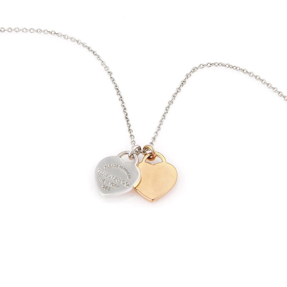 Tiffany & Co Please Return Pendant Double Heart Sterling Silver 18k Rose Gold: Tiffany & Co Please Return Pendant Double Heart Sterling Silver 18k Rose Gold This exquisite Tiffany & Co. pendant and chain from the "Please Return To Tiffany" collection showcases a stunning double