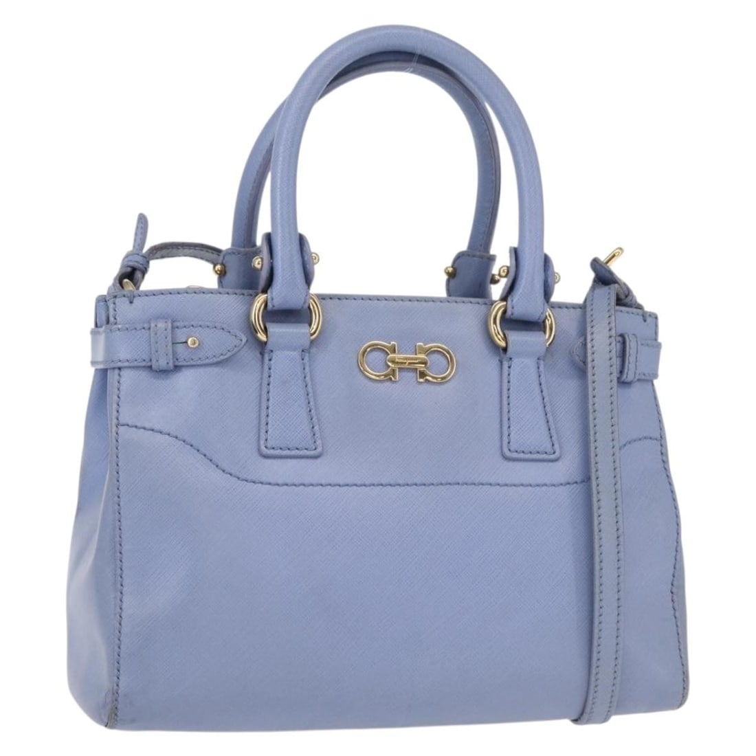 Gancini Blue Tote Bag by Salvatore Ferragamo: Gancini Blue Tote Bag by Salvatore Ferragamo This pre-owned Salvatore Ferragamo Gancini tote bag features a blue exterior with signature design elements. It is designed for women and shows visible sig