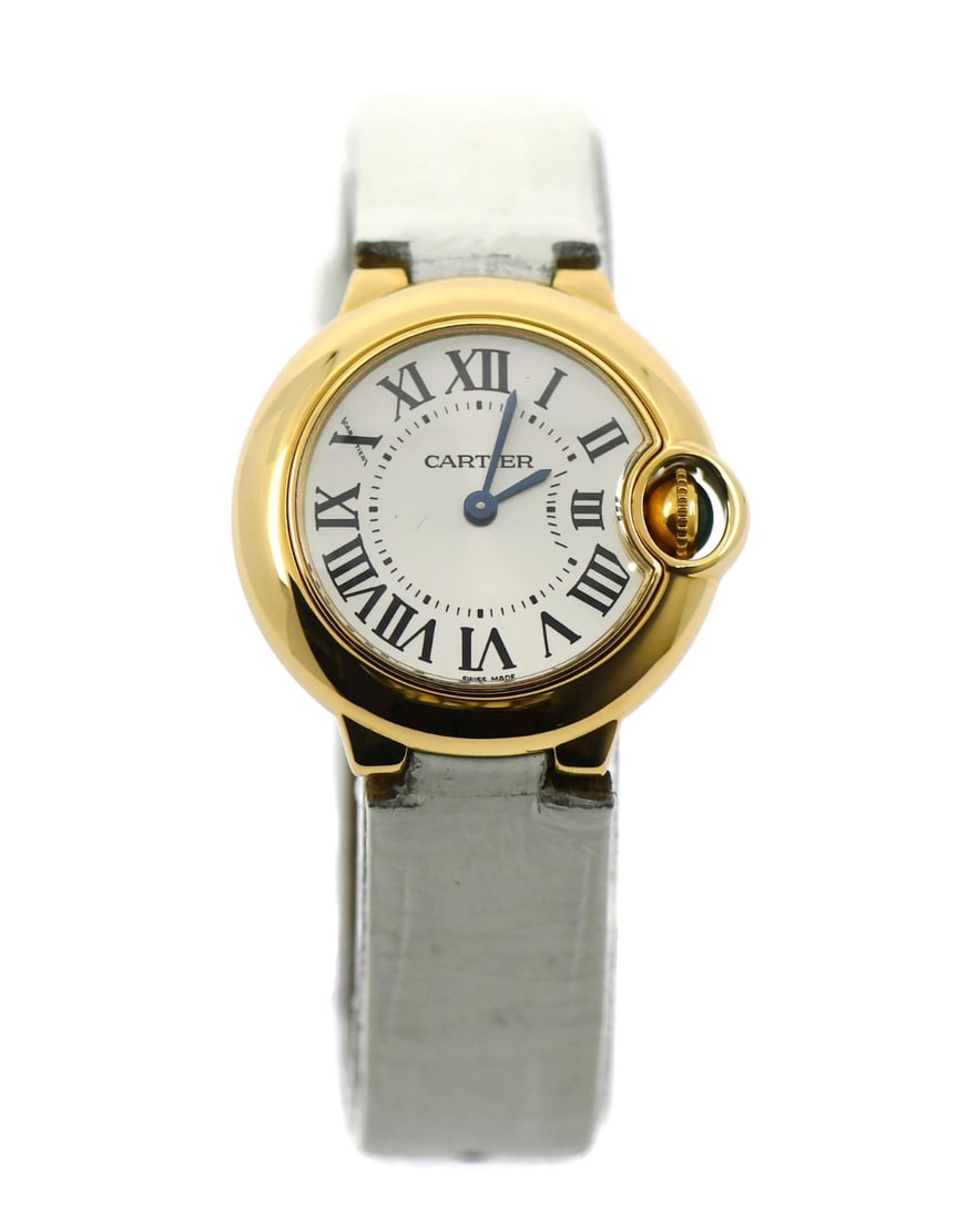 Ballon Bleu de Cartier 28mm 18K Yellow Gold Quartz Watch W6900156 with Box: Ballon Bleu de Cartier 28mm 18K Yellow Gold Quartz Watch W6900156 with Box This Cartier Ballon Bleu wristwatch features an 18K yellow gold case paired with a silver analog dial. The watch is powered b