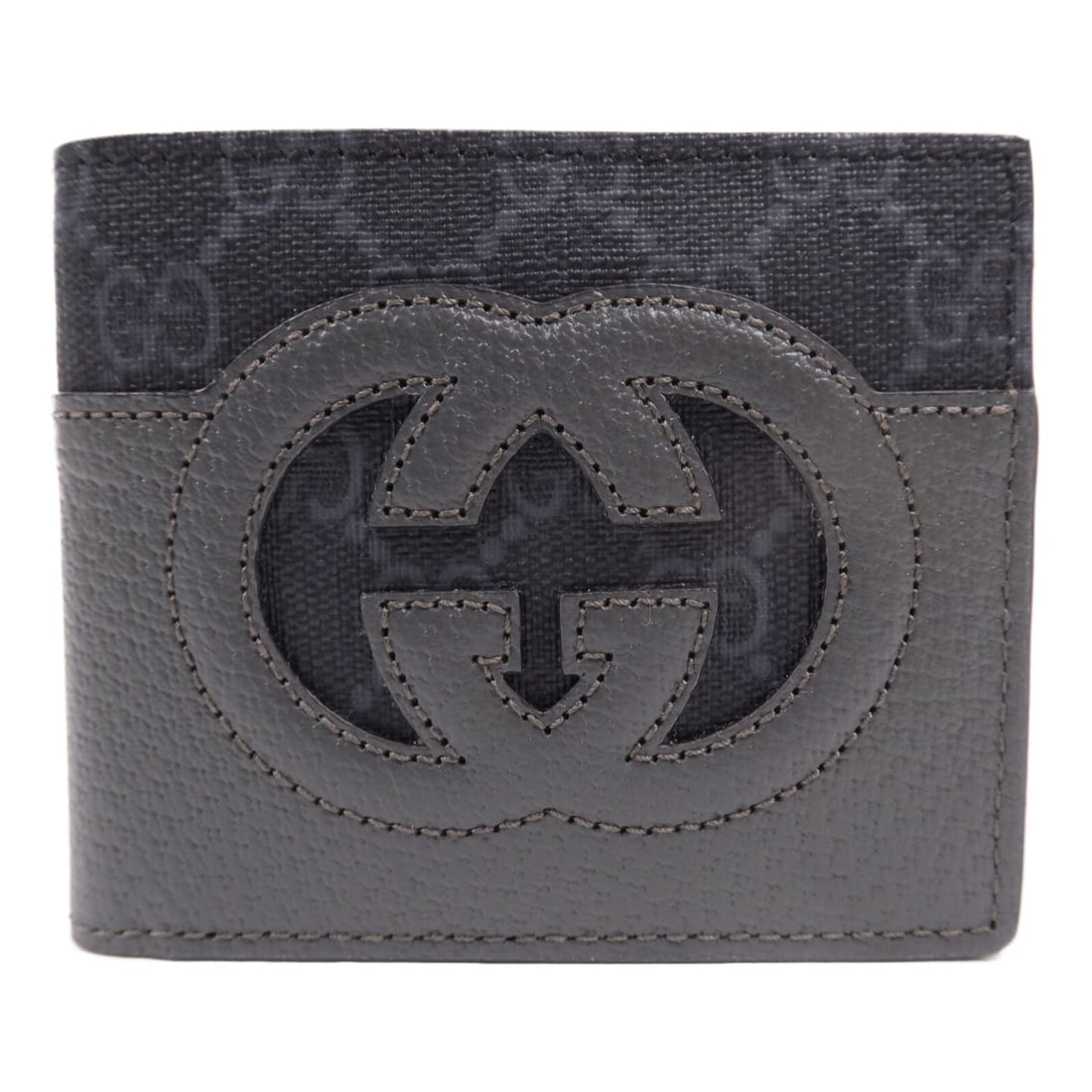 GG 701420 Black and Gray Bifold Wallet in Coated Canvas by Gucci: GG 701420 Black and Gray Bifold Wallet in Coated Canvas by Gucci This Gucci GG bifold wallet is crafted from durable PVC coated canvas in gray and black. It features a regular size and a classic bifol