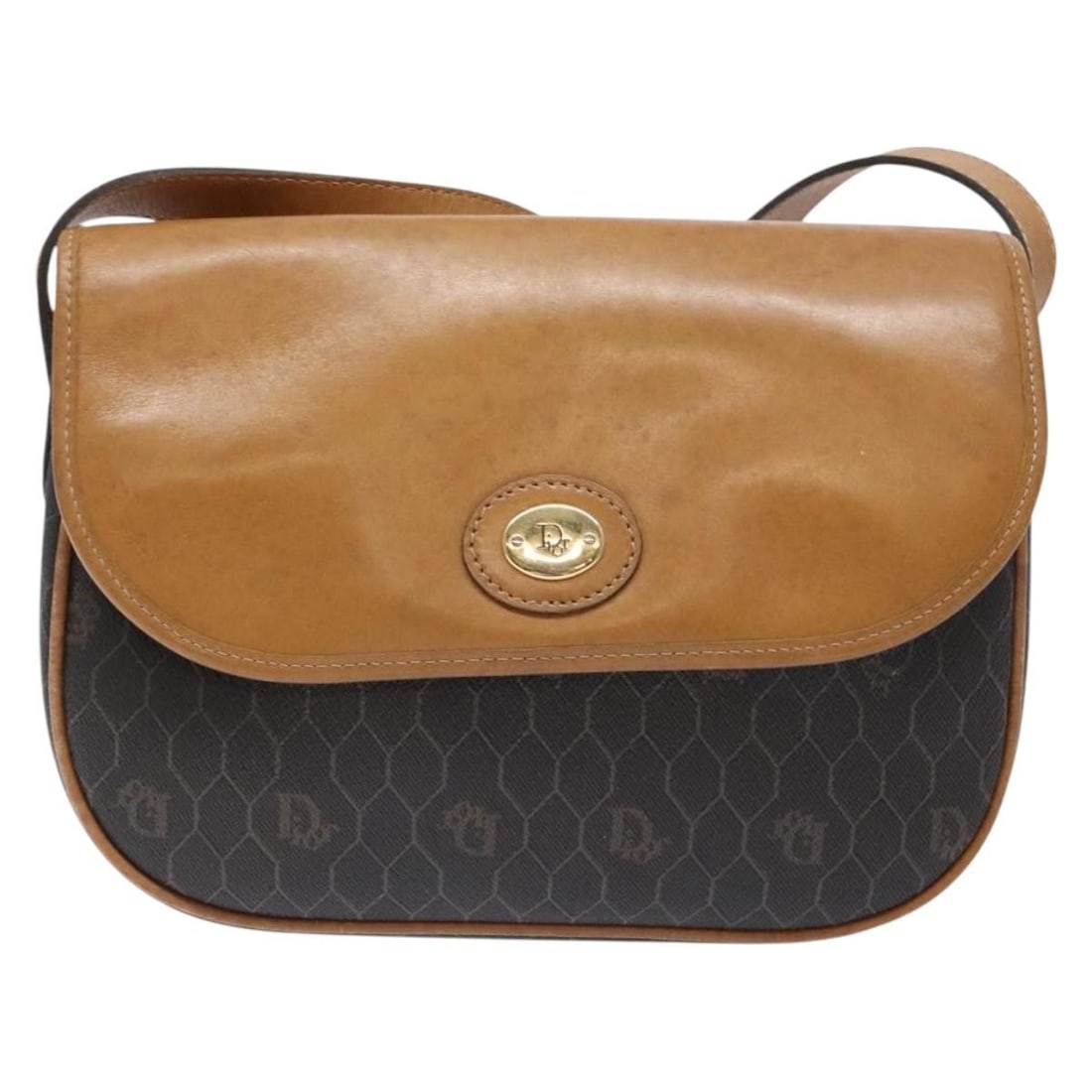 Vintage Honeycomb Pattern Flap Shoulder Bag by Christian Dior in Black: Vintage Honeycomb Pattern Flap Shoulder Bag by Christian Dior in Black This Christian Dior vintage Honeycomb flap crossbody bag features a classic black design with a structured silhouette. The exteri