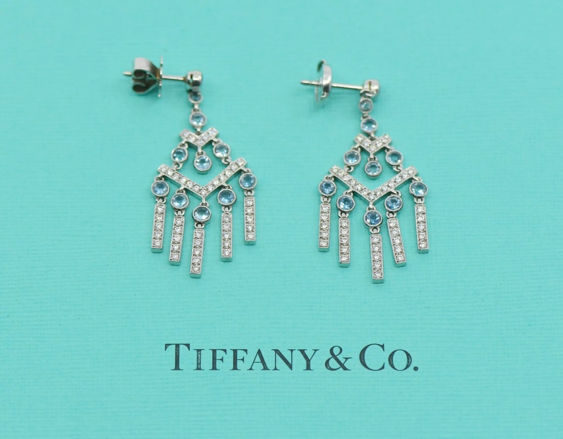 Tiffany & Co Dangle Drop Diamond Aquamarine Platinum Earrings: Tiffany & Co Dangle Drop Diamond Aquamarine Platinum Earrings Elevate your elegance with these exquisite Tiffany & Co. Diamond Aquamarine Platinum Earrings. Crafted from premium 950 platinum, these da
