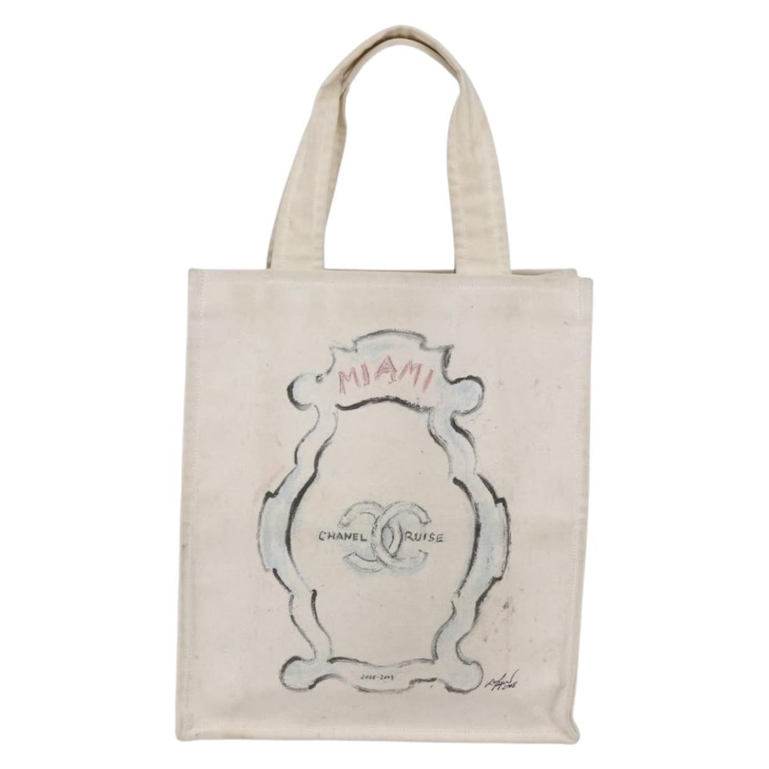 Beige Chanel Cruise Collection Tote Bag: Beige Chanel Cruise Collection Tote Bag This pre-owned Chanel Cruise tote in beige is designed for women and crafted to offer both style and functionality. The bag displays signs of use including surf