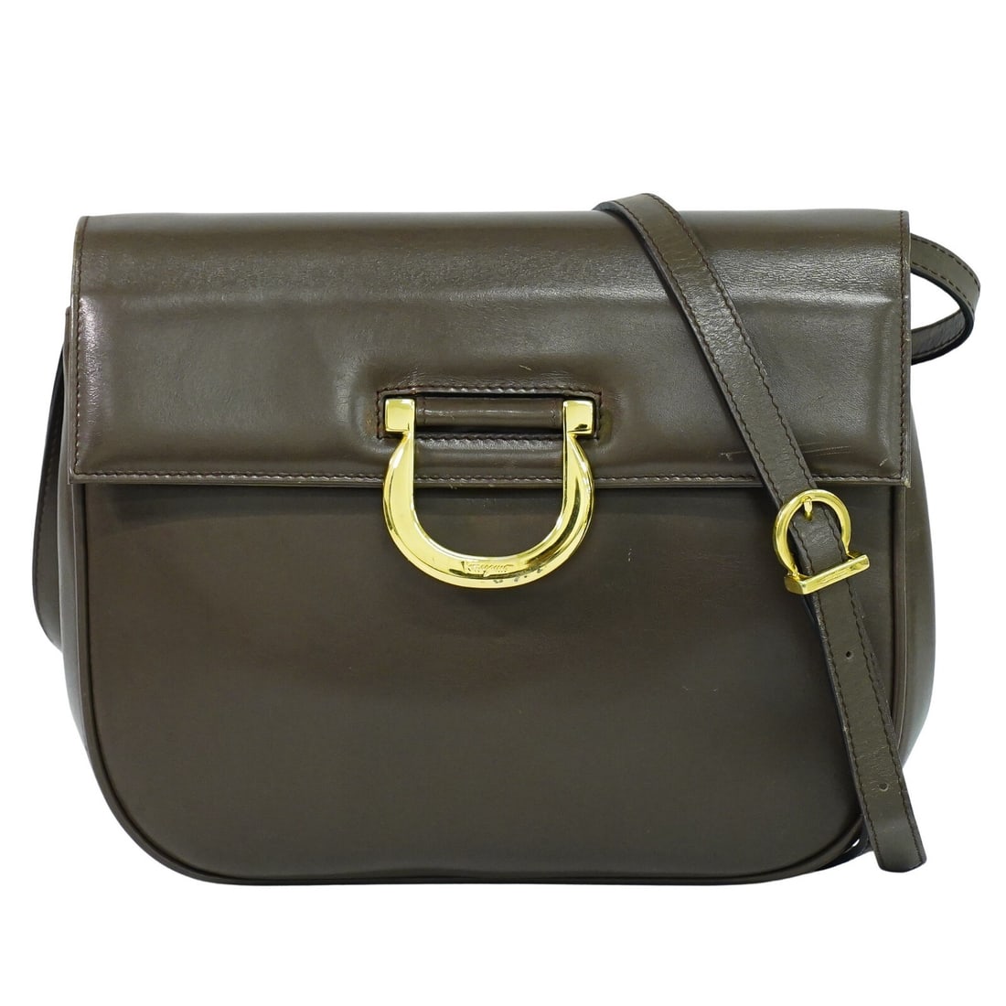 Gancini Brown Shoulder Bag by Salvatore Ferragamo: Gancini Brown Shoulder Bag by Salvatore Ferragamo This Salvatore Ferragamo Gancini shoulder bag is crafted in brown and designed for female use. It is offered in general used condition, showing signs