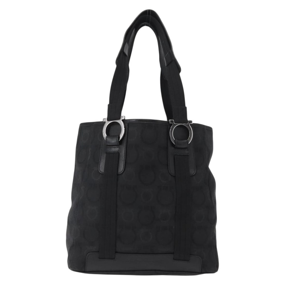 Gancini Black Tote Bag by Salvatore Ferragamo: Gancini Black Tote Bag by Salvatore Ferragamo This pre-owned Salvatore Ferragamo Gancini tote bag features a classic black design and is crafted for female use. The bag shows signs of wear, including