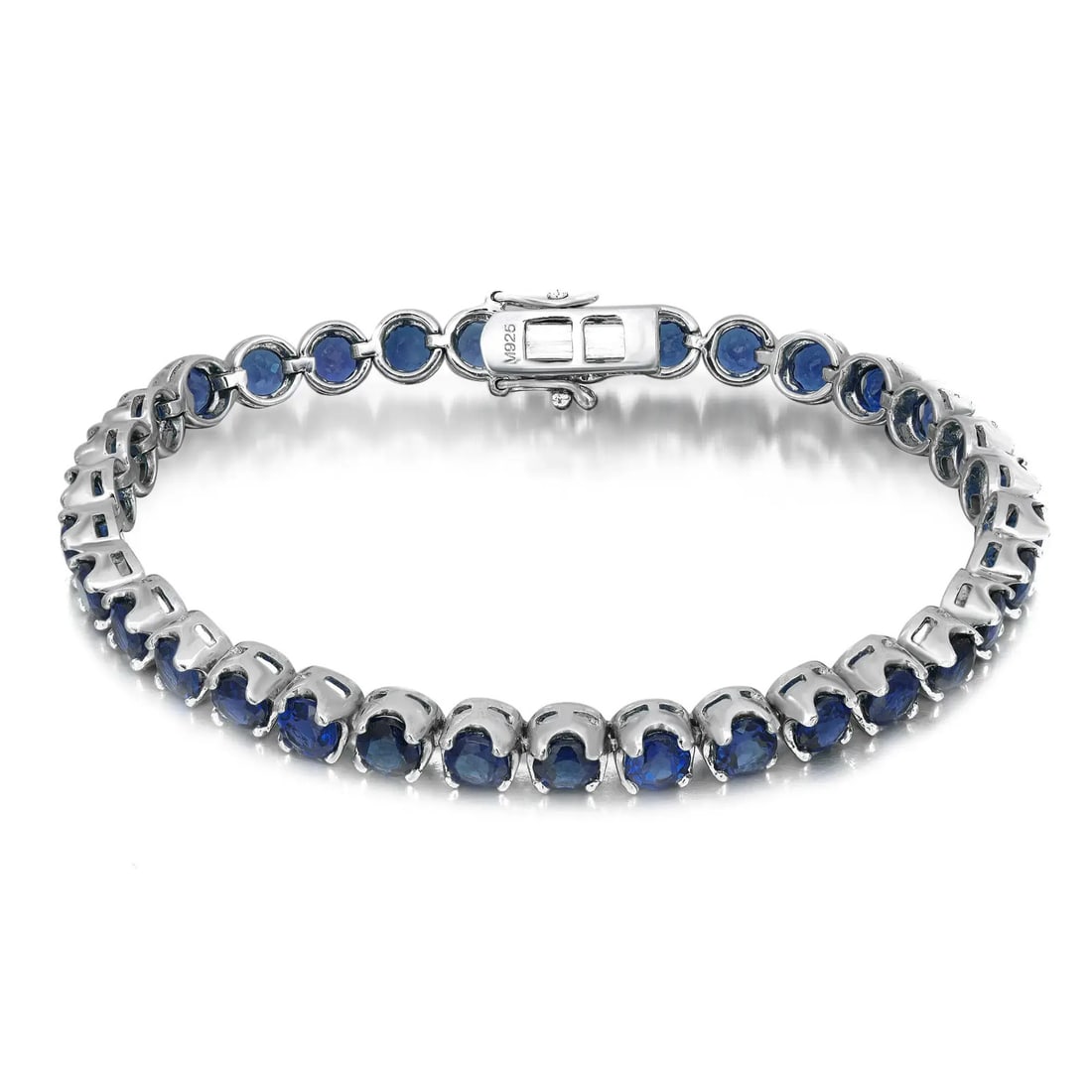 Rachel Koen Prong Set Tanzanite Tennis Bracelet 925 Silver 33 Stones 7 Inch: Rachel Koen Prong Set Tanzanite Tennis Bracelet 925 Silver 33 Stones 7 Inch This exquisite prong set round cut tanzanite tennis bracelet is a stunning addition to any jewelry collection. Crafted from