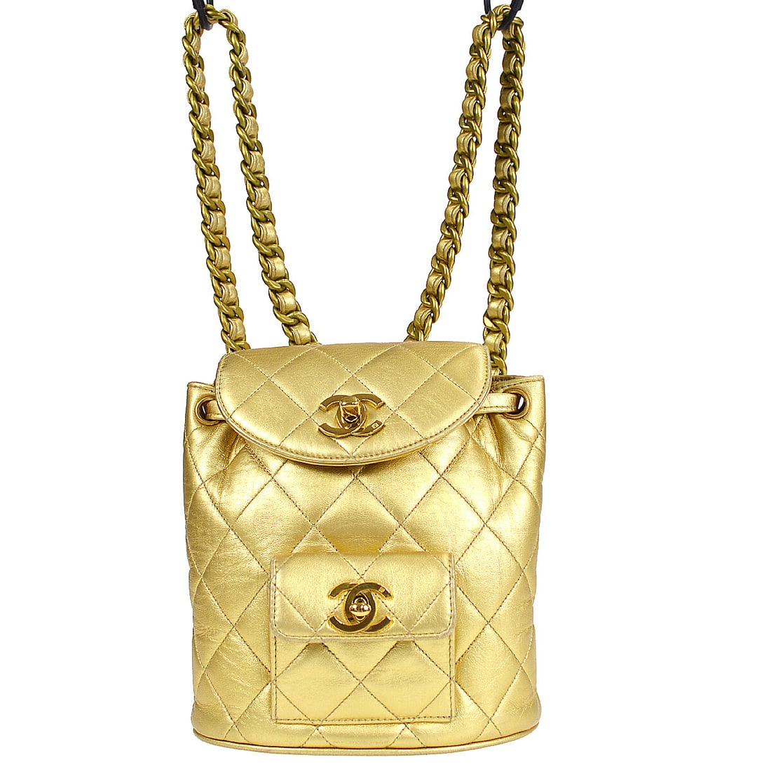 Chanel Duma Small Gold Lambskin Leather Backpack: Chanel Duma Small Gold Lambskin Leather Backpack This Chanel Duma Backpack is a luxurious accessory crafted from premium gold lambskin leather. With its elegant design, it features a turn lock closure