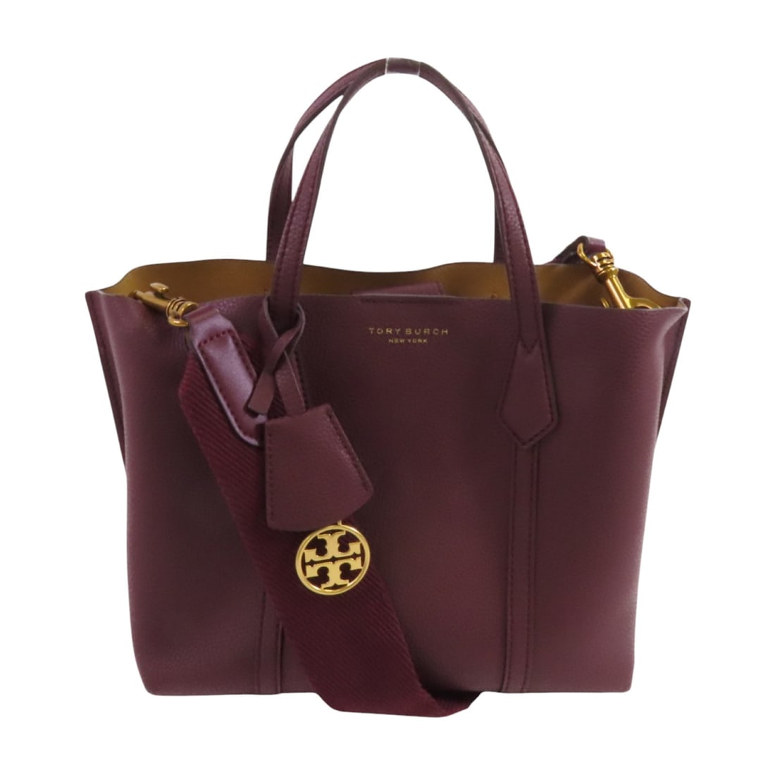 Tory Burch Wine-Red Calfskin Leather 2way Shoulder Bag: Tory Burch Wine-Red Calfskin Leather 2way Shoulder Bag This stylish Tory Burch handbag combines elegance and functionality, featuring a striking wine-red calfskin leather exterior. Designed as a versa