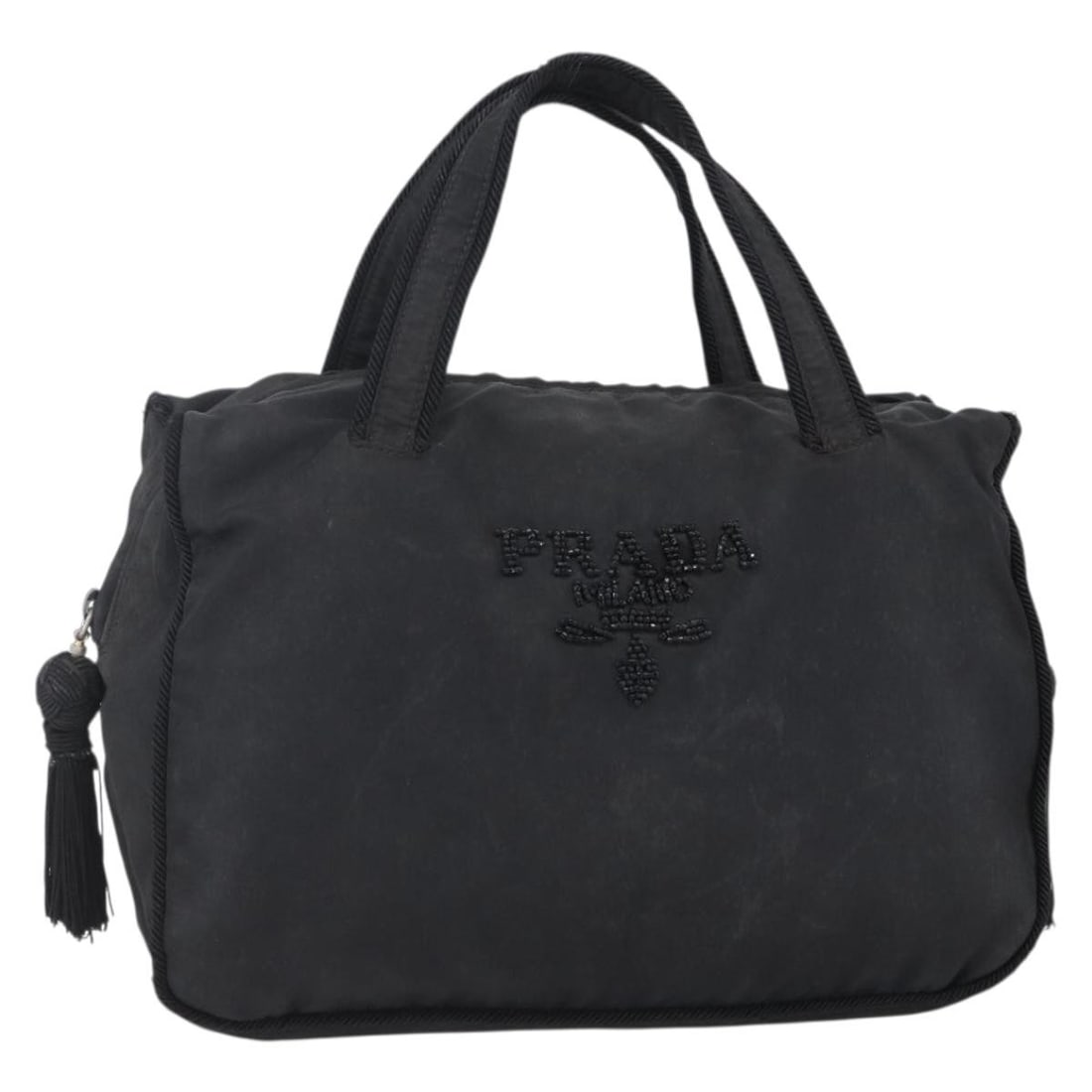 Vintage Prada Black Tote Bag with Wear: Vintage Prada Black Tote Bag with Wear This Prada vintage handbag in black is a pre-owned tote designed for women. It features signs of wear such as surface rubbing, stains, minor deformation, and scr