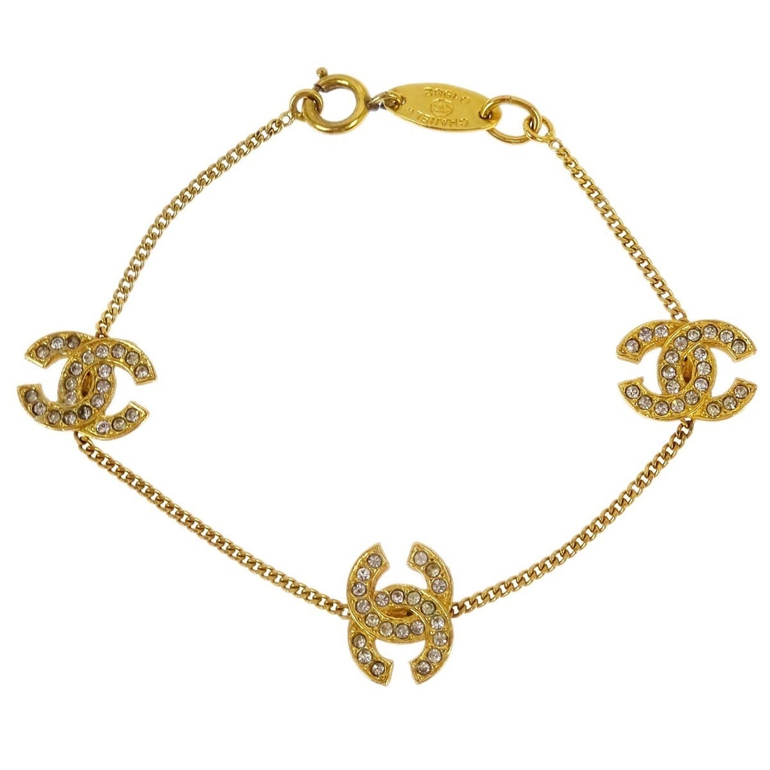 Chanel CC Gold-Plated Chain Bracelet with Rhinestones 4022/1982: Chanel CC Gold-Plated Chain Bracelet with Rhinestones 4022/1982 This stunning Chanel CC Chain Bracelet features a classic CC design in a radiant gold color. Crafted from gold-plated material, it showc