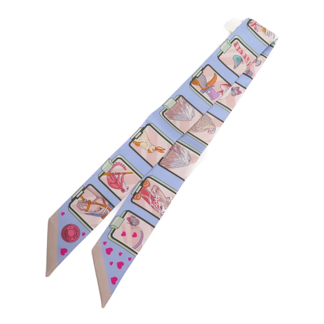 HERMES Multicolor Silk Twilly Scarf Made in France: HERMES Multicolor Silk Twilly Scarf Made in France This exquisite Hermes Twilly Scarf is crafted from luxurious silk, showcasing a vibrant multicolor design that adds a touch of elegance to any outfit