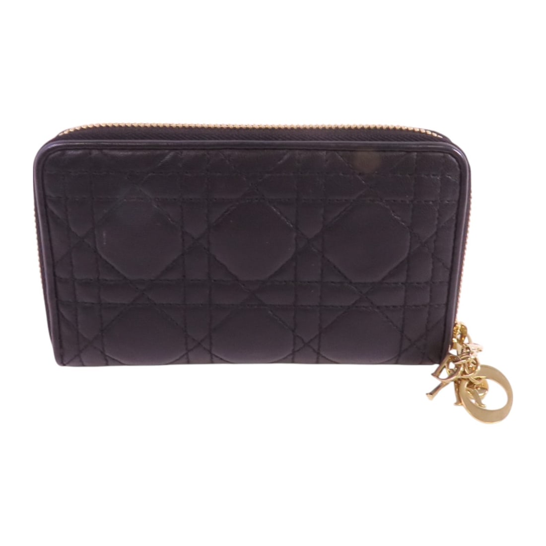 Christian Dior Black Lambskin Leather Zipper Long Wallet: Christian Dior Black Lambskin Leather Zipper Long Wallet This elegant Christian Dior long wallet showcases a sleek and stylish design crafted from luxurious lambskin leather in a classic black hue. Th
