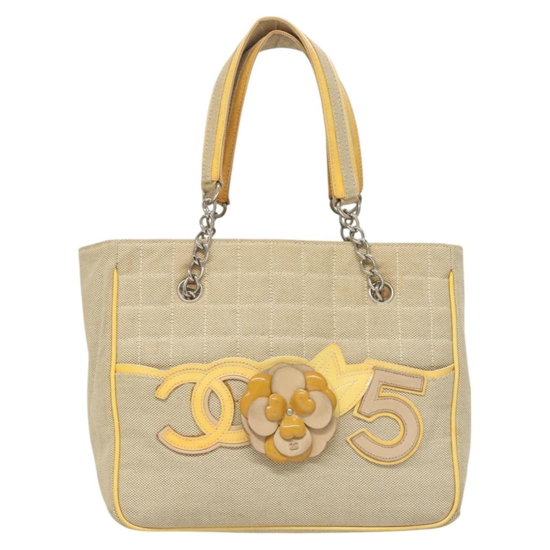 Beige Camellia No.5 Tote Bag by Chanel: Beige Camellia No.5 Tote Bag by Chanel This Chanel Camellia No.5 Tote in beige features a classic design tailored for women. The bag shows signs of wear including loss of shape, rubbing, stains, and s