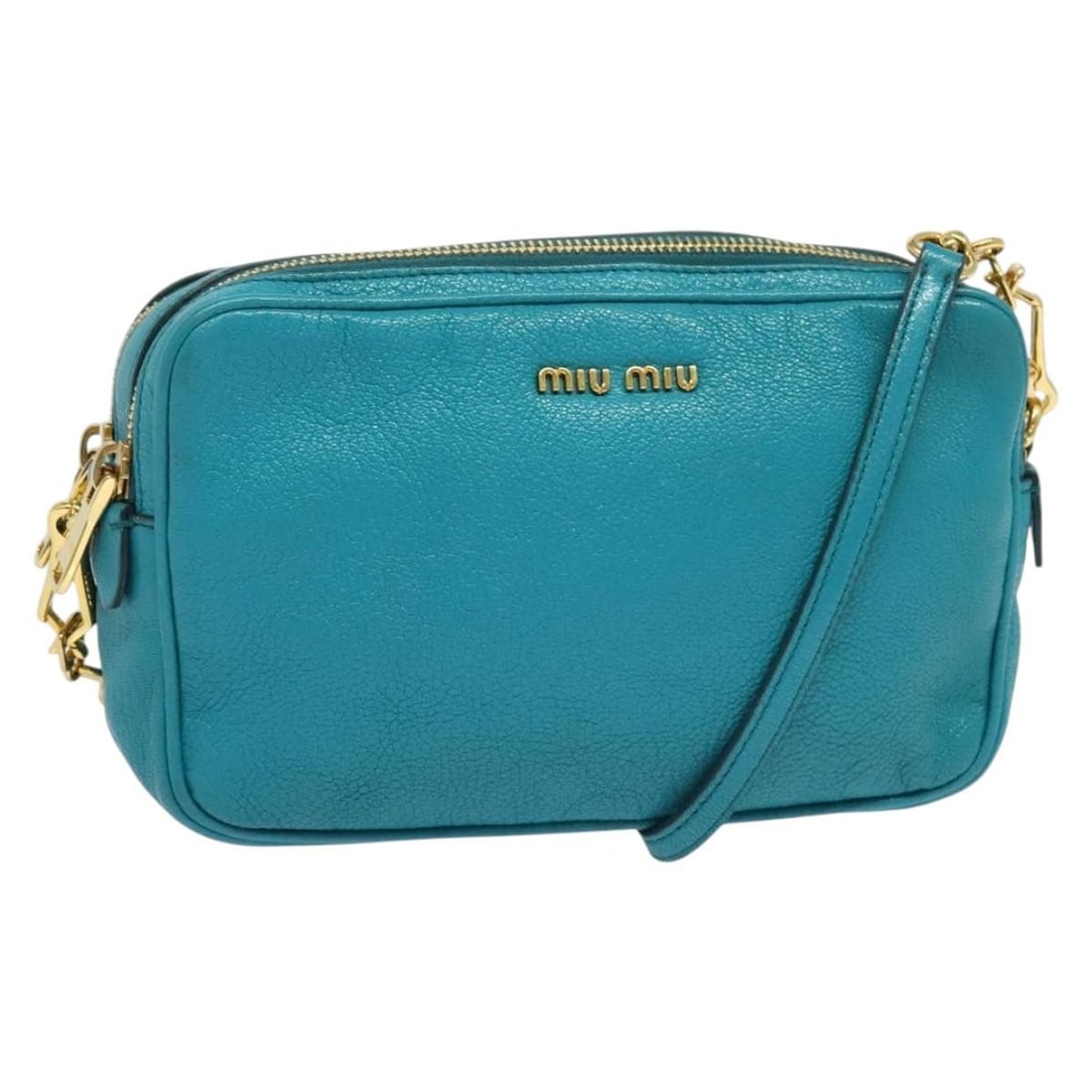 Miu Miu Leather Shoulder Bag Turquoise Blue Gold Auth SW1090: Miu Miu Leather Shoulder Bag Turquoise Blue Gold Auth SW1090 This Miu Miu Shoulder Bag is a chic accessory crafted from high-quality leather in an eye-catching turquoise blue and gold color combinatio