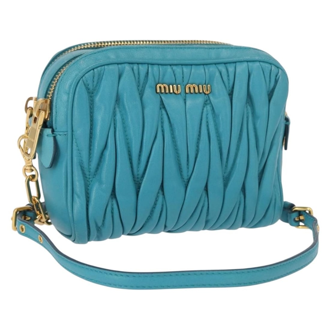 Turquoise Blue Leather Miu Miu Shoulder Bag with Gold Chain Accent: Turquoise Blue Leather Miu Miu Shoulder Bag with Gold Chain Accent This Miu Miu chain shoulder bag is crafted from turquoise blue leather with gold-tone accents. It features a compact design with an a